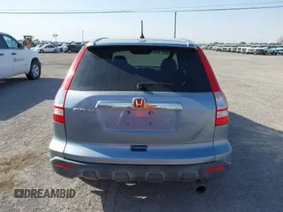 2009 Honda CR-V EX with VIN JHLRE38599C004833, listed as a IAAI auction lot 41982725 with 212,280 mi miles and . Bid and sale history available at carsss.com. Image 16.