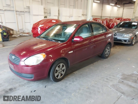 2007 Hyundai Accent GLS with VIN KMHCN46C27U111106, listed as a IAAI auction lot 41383317 with 147,882 mi miles. Bid and sale history available at carsss.com. Image 18.