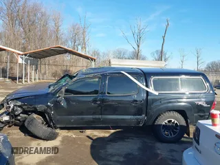 2011 Toyota Tacoma with VIN 3TMLU4EN4BM058738, listed as a IAAI auction lot 41646897 with 117,817 mi miles and . Bid and sale history available at DreamBid. Image 14.