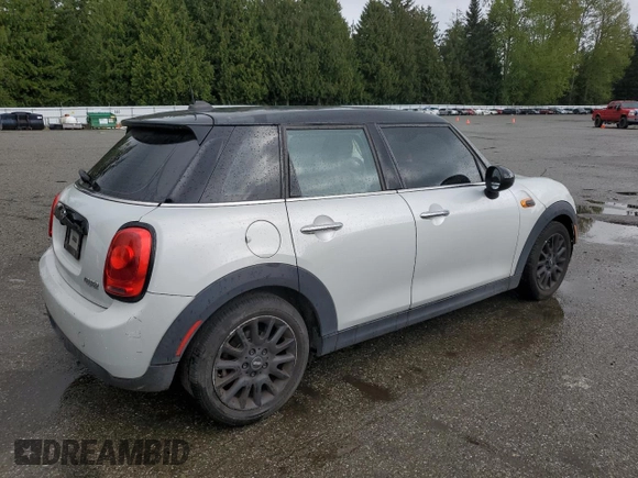 2016 MINI Hardtop 4 Door z VIN WMWXU1C51G2D12553, wystawiony jako Copart lot #52935265 z przebiegiem 57 593 mil mil oraz Szkoda całkowita • Salvage title. Historia ofert i sprzedaży dostępna na DreamBid. Obrazek 3.