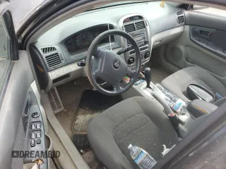2005 Kia Spectra with VIN KNAFE162655074198, listed as a Copart auction lot 71015104 with 200,819 mi miles and Salvage Title. Bid and sale history available at DreamBid. Image 8.