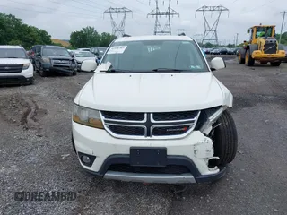 2017 Dodge Journey SXT with VIN 3C4PDDBG2HT702775, listed as a IAAI auction lot 42596303 with 130,639 mi miles and . Bid and sale history available at DreamBid. Image 13.
