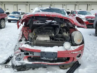 2010 MINI Convertible with VIN WMWMR3C57ATU97979, listed as a Copart auction lot 45903855 with 154,614 mi miles and Salvage Title. Bid and sale history available at DreamBid. Image 5.