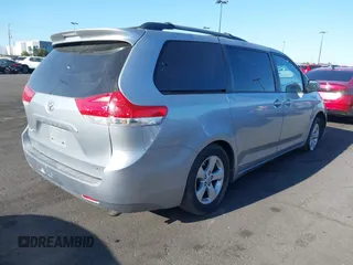2014 Toyota Sienna LE AAS with VIN 5TDKK3DC7ES435109, listed as a IAAI auction lot 41963135 with 175,517 mi miles and . Bid and sale history available at DreamBid. Image 4.