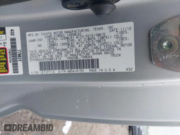 2013 Toyota Tacoma with VIN 5TFNX4CN7DX021473, listed as a IAAI auction lot 42183007 with 71,095 mi miles and . Bid and sale history available at DreamBid. Image 9.