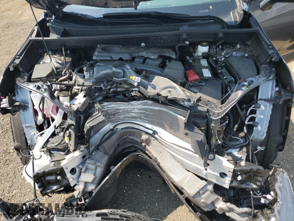 2024 Toyota RAV4 XLE with VIN 2T3P1RFVXRC484711, listed as a Copart auction lot 60511415 with 9,836 mi miles and Salvage title. Bid and sale history available at DreamBid. Image 12.