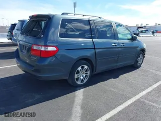 2005 Honda Odyssey EX-L with VIN 5FNRL38735B057514, listed as a IAAI auction lot 41762185 with 264,851 mi miles. Bid and sale history available at carsss.com. Image 4.