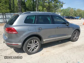 2016 Volkswagen Touareg Sport с VIN WVGEF9BP1GD012594, выставлен на аукционе Copart как лот 52438305 с пробегом 125 204 миль миль и Списание • Salvage title. История ставок и продаж доступна на DreamBid. Изображение 3.