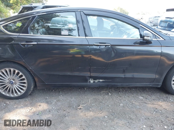 2013 Ford Fusion Titanium with VIN 3FA6P0K91DR115901, listed as a IAAI auction lot 42779096 with 191,451 mi miles and . Bid and sale history available at DreamBid. Image 14.