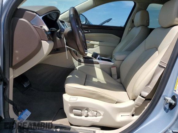2013 Cadillac SRX Performance Collection with VIN 3GYFNDE37DS535759, listed as a Copart auction lot 52620105 with 92,059 mi miles and Salvage title. Bid and sale history available at DreamBid. Image 7.