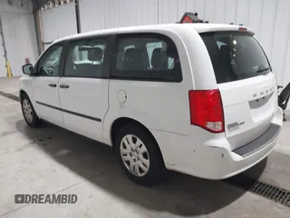 2016 Dodge Grand Caravan SE with VIN 2C4RDGBG1GR392484, listed as a IAAI auction lot 41663549 with 126,882 mi miles and . Bid and sale history available at DreamBid. Image 3.