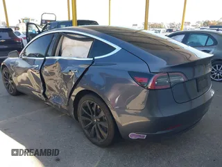 2018 Tesla Model 3 Long Range Battery with VIN 5YJ3E1EA7JF163401, listed as a IAAI auction lot 41829681 with 90,065 mi miles. Bid and sale history available at carsss.com. Image 3.
