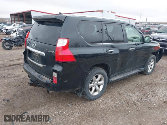 2011 Lexus GX 460 with VIN JTJBM7FXXB5021029, listed as a IAAI auction lot 41944230 with 209,722 mi miles. Bid and sale history available at carsss.com. Image 4.