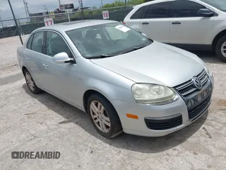 2007 Volkswagen Jetta Wolfsburg Edition z VIN 3VWEF71K87M196027, wystawiony jako IAAI lot #42804650 z przebiegiem 205 019 mil mil oraz . Historia ofert i sprzedaży dostępna na DreamBid. Obrazek 1.