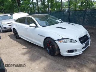 2014 Jaguar XJ with VIN SAJWA2EK8EMV67443, listed as a IAAI auction lot 42483075 with 88,357 mi miles and . Bid and sale history available at DreamBid. Image 1.