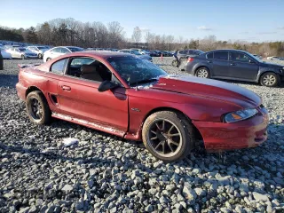 1996 Ford Mustang GT z VIN 1FALP42X0TF168223, wystawiony jako Copart lot #46351085 z przebiegiem 121 657 mil mil oraz Szkoda całkowita • Salvage title. Historia ofert i sprzedaży dostępna na DreamBid. Obrazek 4.