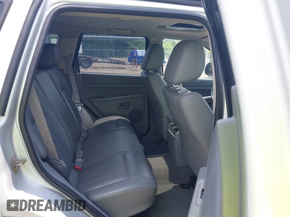 2005 Jeep Grand Cherokee Laredo z VIN 1J4GR48K35C515589, wystawiony jako IAAI lot #42452874 z przebiegiem 253 743 mil mil oraz . Historia ofert i sprzedaży dostępna na DreamBid. Obrazek 8.