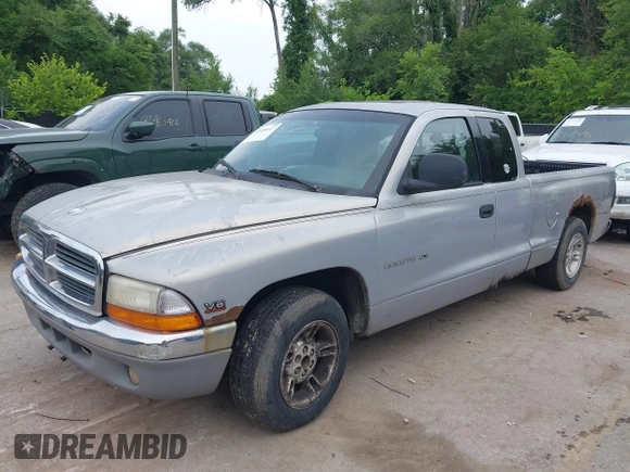 2000 Dodge Dakota with VIN 1B7GL22X7YS781191, listed as a IAAI auction lot 42498147 with 283,341 mi miles and . Bid and sale history available at DreamBid. Image 2.