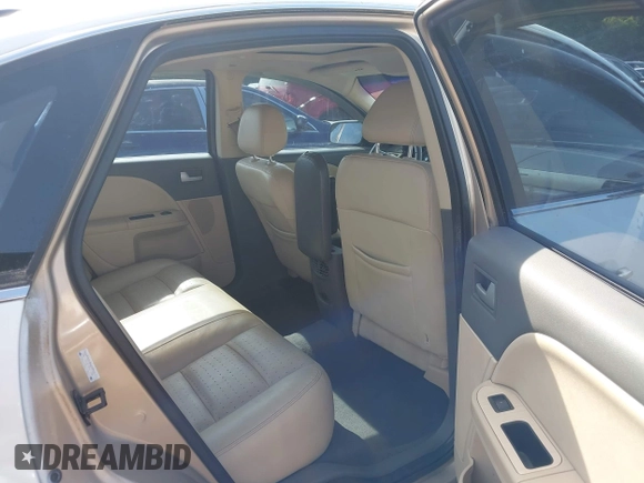 2008 Mercury Sable Premier z VIN 1MEHM42WX8G600980, wystawiony jako IAAI lot #42188836 z przebiegiem Nie podano mil oraz . Historia ofert i sprzedaży dostępna na DreamBid. Obrazek 8.
