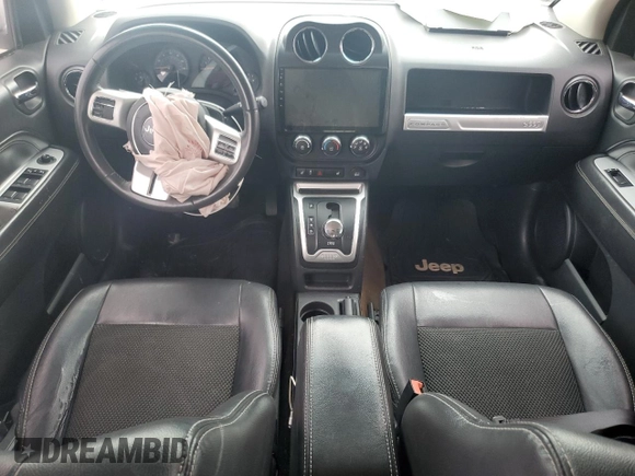 2016 Jeep Compass Latitude with VIN 1C4NJCEA4GD614932, listed as a Copart auction lot 60508845 with 144,833 mi miles and Salvage title. Bid and sale history available at DreamBid. Image 8.