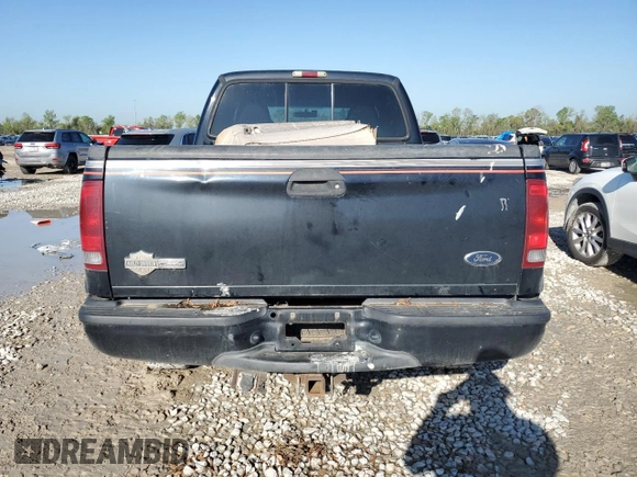 2004 Ford F-250 XL with VIN 1FTNW21P14ED06757, listed as a Copart auction lot 50412115 with 199,501 mi miles and Salvage title. Bid and sale history available at DreamBid. Image 6.