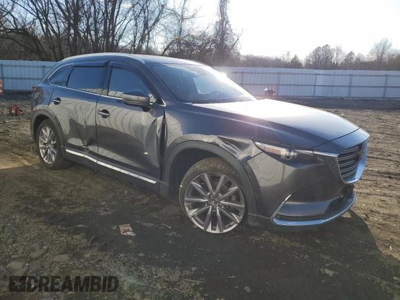 2020 Mazda CX-9 Grand Touring with VIN JM3TCBDY0L0412463, listed as a Copart auction lot 88532115 with 86,015 mi miles and Salvage Title. Bid and sale history available at DreamBid. Image 4.