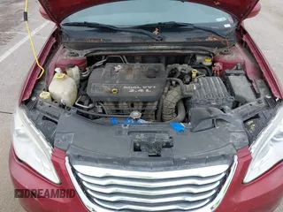 2012 Chrysler 200 LX with VIN 1C3CCBAB5CN200089, listed as a IAAI auction lot 42078609 with 114,384 mi miles and . Bid and sale history available at carsss.com. Image 10.