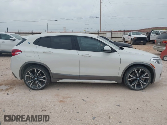 2018 BMW X2 xDrive28i z VIN WBXYJ5C31JEF82624, wystawiony jako IAAI lot #42066439 z przebiegiem 79 454 mil mil oraz . Historia ofert i sprzedaży dostępna na DreamBid. Obrazek 13.