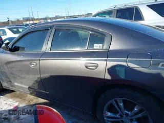 2013 Dodge Charger RT Plus with VIN 2C3CDXDT7DH558898, listed as a IAAI auction lot 41364210 with 144,351 mi miles. Bid and sale history available at carsss.com. Image 14.
