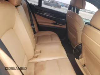 2011 BMW 7 Series 750i with VIN WBAKA8C5XBCY37073, listed as a Copart auction lot 76238914 with 129,493 mi miles and Clean title. Bid and sale history available at DreamBid. Image 10.