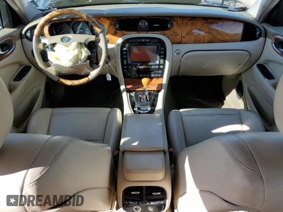 2004 Jaguar XJ with VIN SAJEA71C94SG12751, listed as a Copart auction lot 80219804 with 0 mi miles and Non Repairable. Bid and sale history available at carsss.com. Image 8.