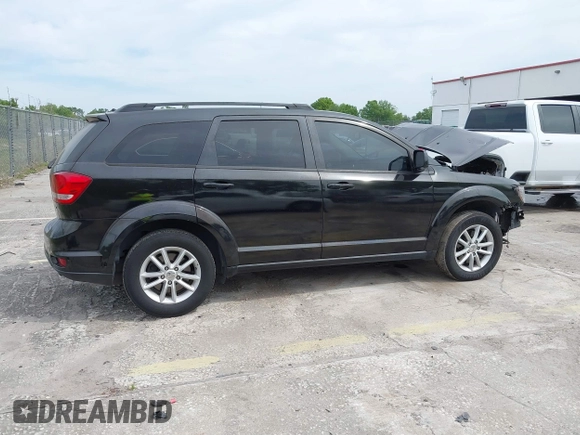 2015 Dodge Journey SXT with VIN 3C4PDCBB3FT577121, listed as a IAAI auction lot 41855712 with Not Provided miles and . Bid and sale history available at DreamBid. Image 13.