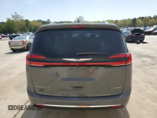 2021 Chrysler Pacifica Hybrid Touring L with VIN 2C4RC1L73MR603162, listed as a Copart auction lot 51253685 with Not provided miles and Salvage title. Bid and sale history available at DreamBid. Image 6.