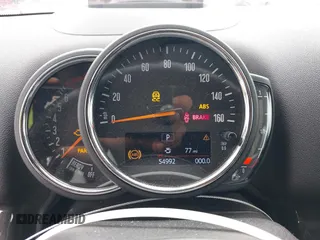 2018 MINI Countryman Cooper S z VIN WMZYT3C31J3D99568, wystawiony jako IAAI lot #42131017 z przebiegiem 54 992 mil mil oraz . Historia ofert i sprzedaży dostępna na DreamBid. Obrazek 7.