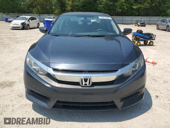 2017 Honda Civic LX z VIN 19XFC2F55HE026662, wystawiony jako Copart lot #55019905 z przebiegiem 81 075 mil mil oraz Szkoda całkowita • Salvage title. Historia ofert i sprzedaży dostępna na DreamBid. Obrazek 5.