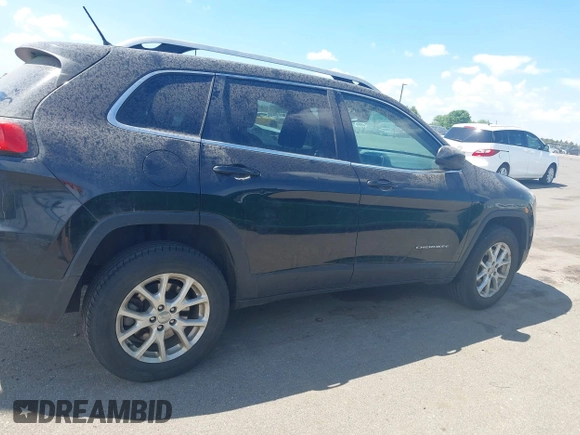 2015 Jeep Cherokee Latitude with VIN 1C4PJMCS3FW545440, listed as a IAAI auction lot 42268676 with 197,192 mi miles and . Bid and sale history available at DreamBid. Image 13.