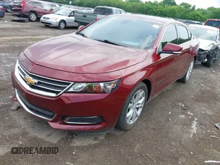 2016 Chevrolet Impala LT with VIN 2G1115S39G9205640, listed as a IAAI auction lot 42145225 with 131,765 mi miles and . Bid and sale history available at DreamBid. Image 2.