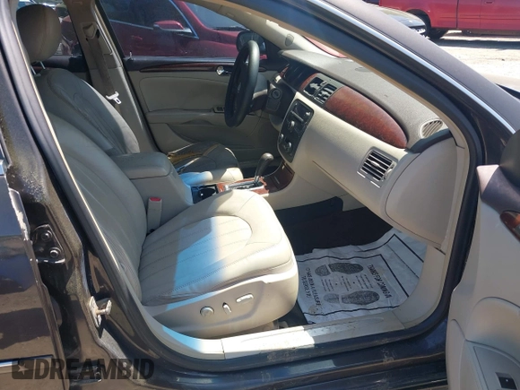 2009 Buick Lucerne CXL with VIN 1G4HD57M59U122626, listed as a IAAI auction lot 42004989 with 184,026 mi miles. Bid and sale history available at carsss.com. Image 5.