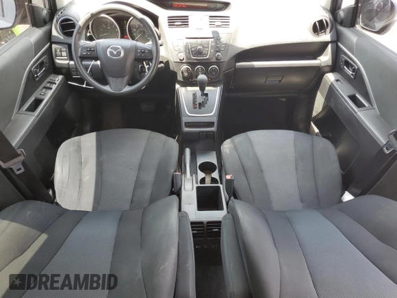 2014 Mazda 5 Sport z VIN JM1CW2BL0E0170901, wystawiony jako Copart lot #57829555 z przebiegiem 102 210 mil mil oraz Szkoda całkowita • Salvage title. Historia ofert i sprzedaży dostępna na DreamBid. Obrazek 8.