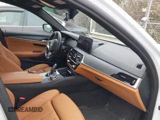 2023 BMW 5 Series 530i xDrive with VIN WBA13BJ06PWY21307, listed as a IAAI auction lot 41244931 with 12,391 mi miles and . Bid and sale history available at DreamBid. Image 5.