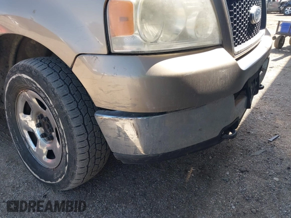 2005 Ford F-150 XLT with VIN 1FTPX14525NA78019, listed as a IAAI auction lot 41932381 with 170,153 mi miles. Bid and sale history available at carsss.com. Image 6.