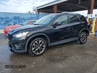 2016 Mazda CX-5 Grand Touring with VIN JM3KE2DY8G0805736, listed as a Copart auction lot 86765064 with 98,276 mi miles and Salvage Title. Bid and sale history available at carsss.com. Image 1.