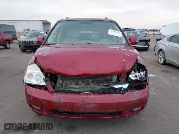 2012 Kia Sedona EX with VIN KNDMH4C76C6463143, listed as a IAAI auction lot 41990970 with 214,045 mi miles. Bid and sale history available at carsss.com. Image 12.