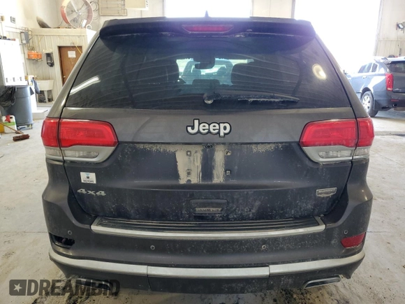 2017 Jeep Grand Cherokee Summit with VIN 1C4RJFJT4HC723876, listed as a Copart auction lot 52647205 with 97,412 mi miles and Salvage title. Bid and sale history available at DreamBid. Image 6.