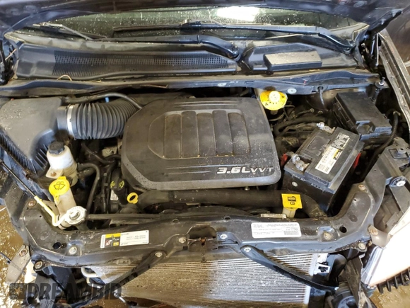 2015 Chrysler Town & Country Touring L with VIN 2C4RC1CG5FR705890, listed as a Copart auction lot 53276155 with 137,670 mi miles and Clean Title. Bid and sale history available at DreamBid. Image 12.