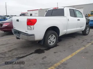 2012 Toyota Tundra z VIN 5TFUM5F11CX039386, wystawiony jako IAAI lot #41472576 z przebiegiem 213 295 mil mil oraz . Historia ofert i sprzedaży dostępna na DreamBid. Obrazek 4.