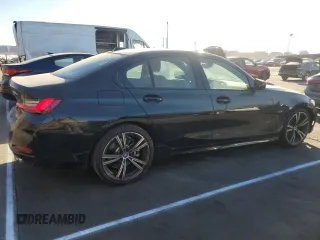2023 BMW 3 Series 330e with VIN 3MW39FF03P8D33433, listed as a Copart auction lot 86197104 with 12,023 mi miles and Salvage Title. Bid and sale history available at carsss.com. Image 3.