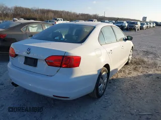 2011 Volkswagen Jetta Sedan S with VIN 3VW2K7AJ8BM357328, listed as a IAAI auction lot 40982182 with 125,031 mi miles. Bid and sale history available at carsss.com. Image 4.