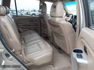 2005 Honda Pilot EX-L with NAVI with VIN 2HKYF18775H543185, listed as a IAAI auction lot 41597576 with 163,377 mi miles. Bid and sale history available at carsss.com. Image 8.