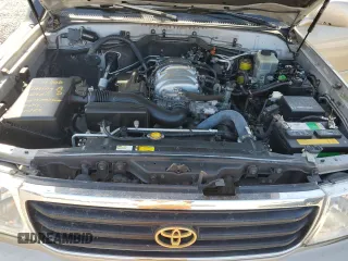 1999 Toyota Land Cruiser z VIN JT3HT05J0X0039052, wystawiony jako Copart lot #54229355 z przebiegiem 228 216 mil mil oraz Czysty tytuł • Clean title. Historia ofert i sprzedaży dostępna na DreamBid. Obrazek 12.